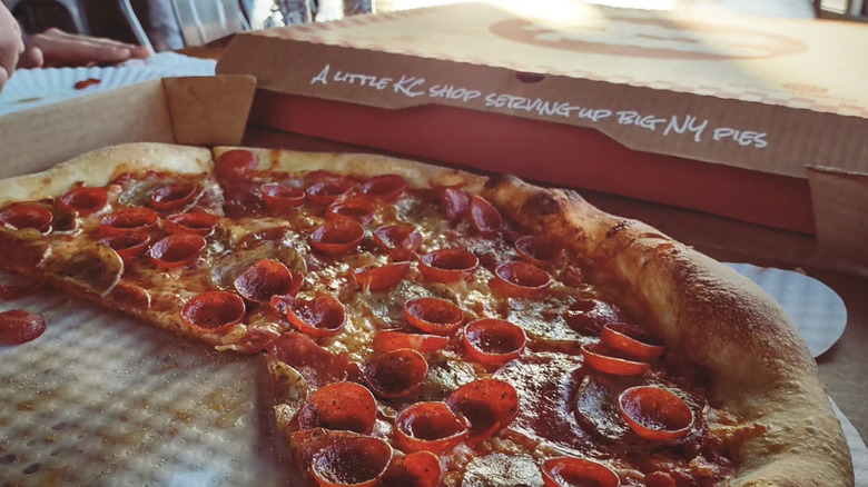 Close up of pepperoni pizza and box from Pizza Tascio.