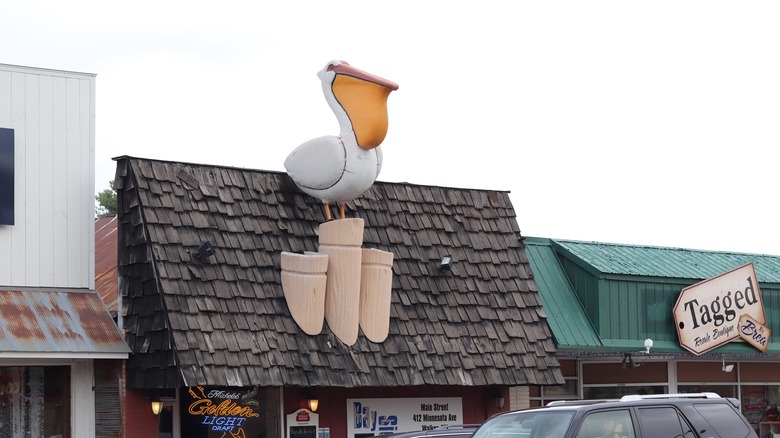 Roof of The Bayside Bar & Grill in Walker, Minnesota, with a pelican statue