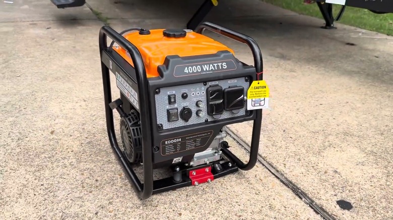 Efurden generator on concrete in front of a trailer rig