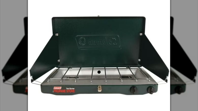 Black Coleman Matchlight 10,000 BTU 2-Burner Propane Stove on white background