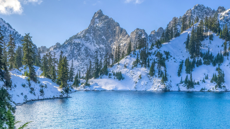 Shoreline of Gem Lake in winter with snowy peaks
