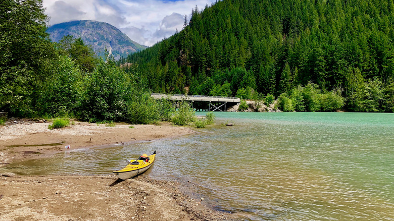 A canoe rests on the side of Lake Diablo