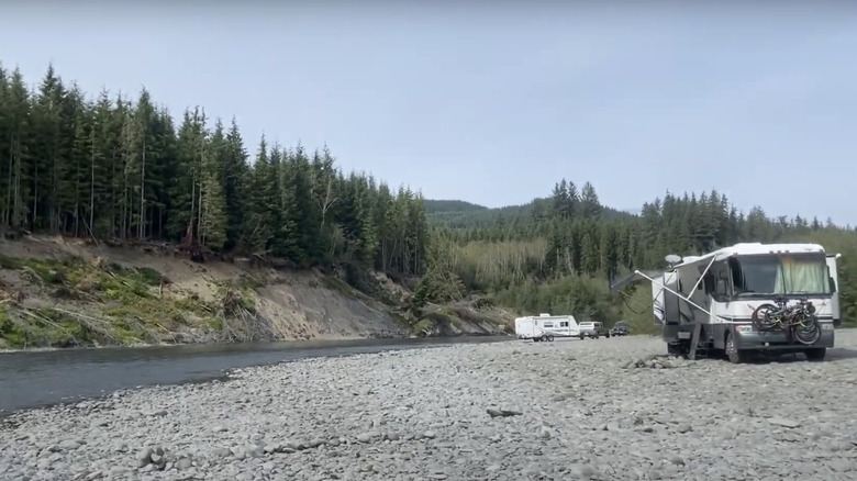 An RV parked by the Hoh River at Allen's Bar Campground