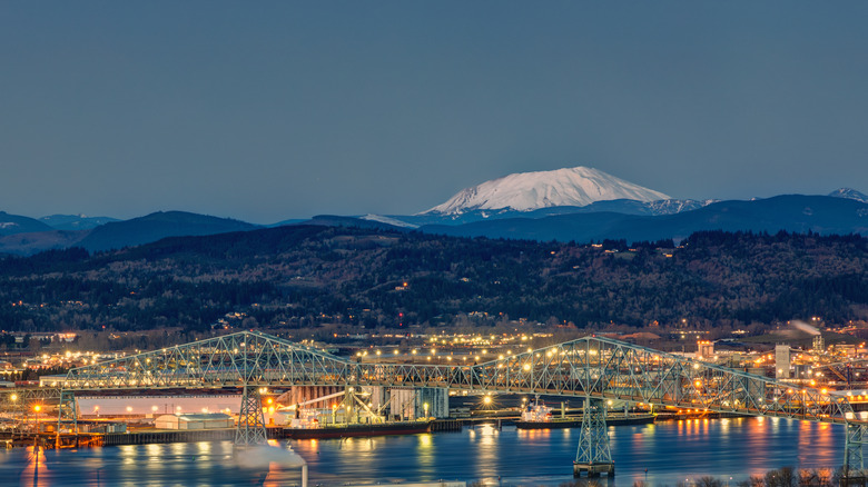 Twilight view of Lewis & Clark bridge near Longview, Washington, with Mount St. Helens in background