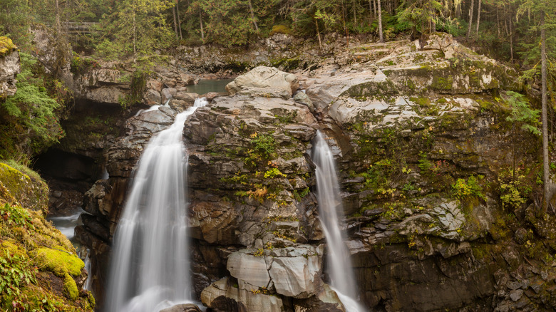 Waterfall flowing over rocky cliff