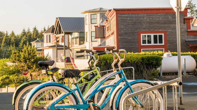 A row of colorful bicycles in front of beach houses in Seabrook, Washington.