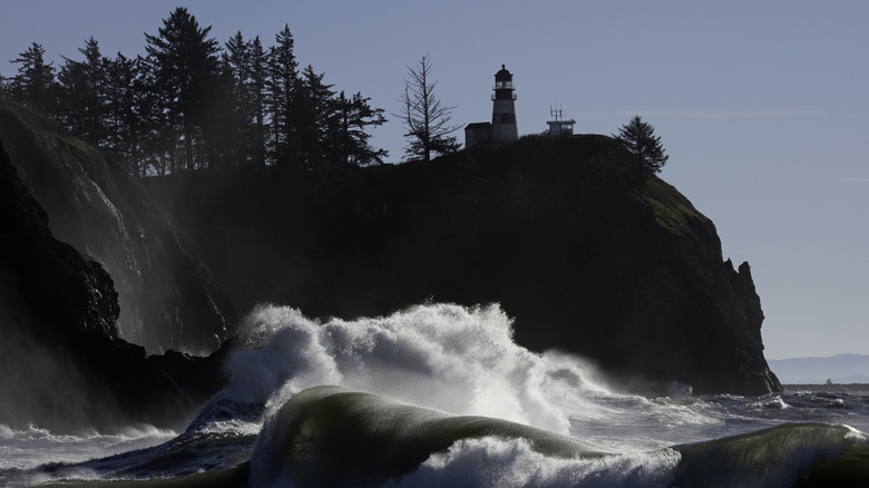 Waves crash on the rock faces of Cape Disappointment in Washington State