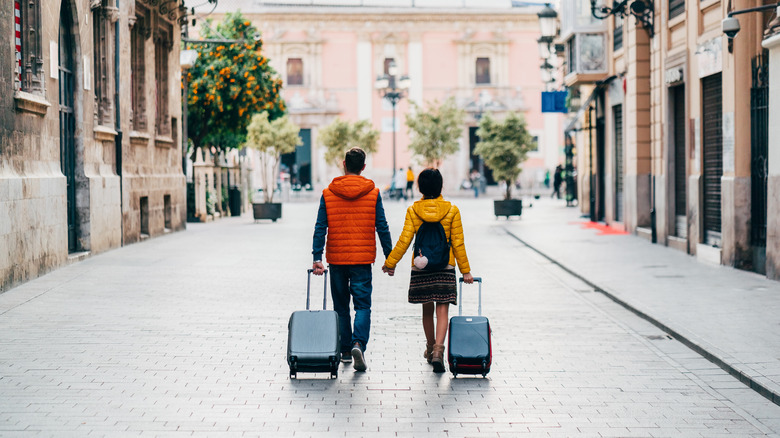 A couple traveling