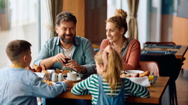 Family eating breakfast at a hotel