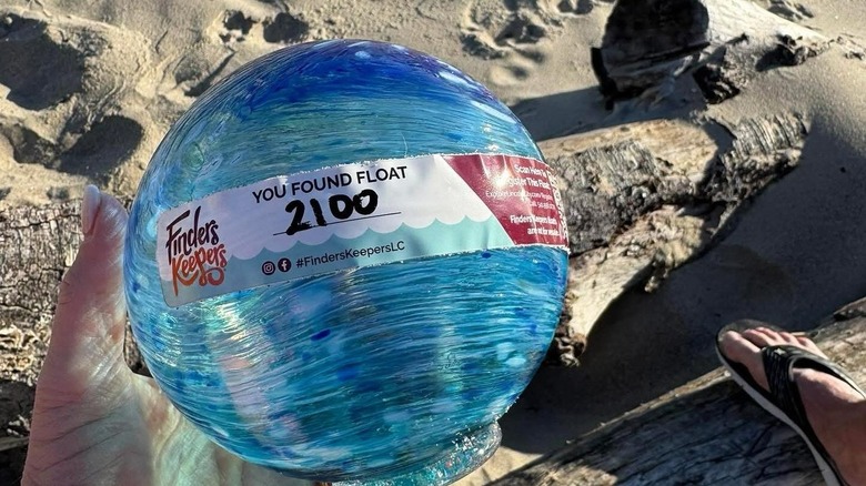 A picture of glass float found on beach in Lincoln City with number on it