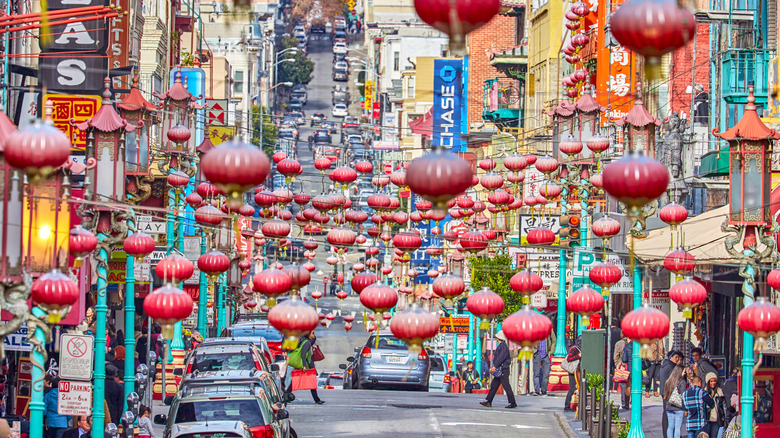 A street in Chinatown in San Francisco with red lanterns in the foreground