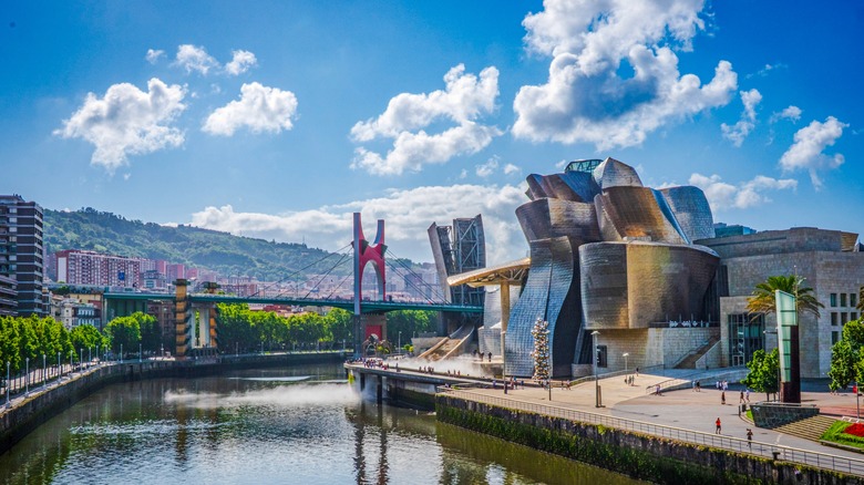 The classic Frank Gehry Guggenheim Bilbao with with shiny, shaped exterior