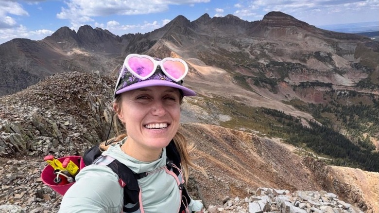 A selfie taken on a mountainous trail by Appalachian Trail FKT record holder Tara Dower