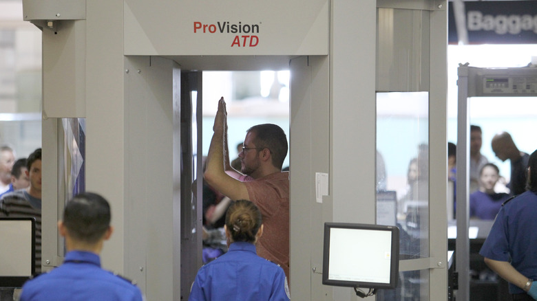 Person in full-body scanner 