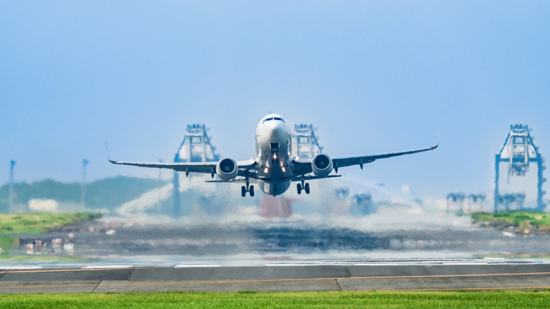 A plane taking off at an airport
