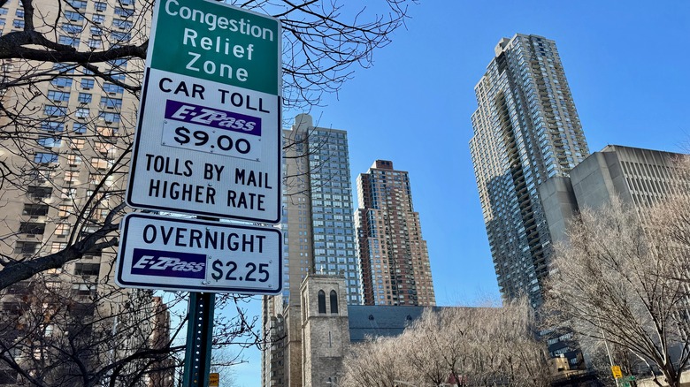 Street sign in Manhattan for the Congestion Relief Zone with skyscapers in background