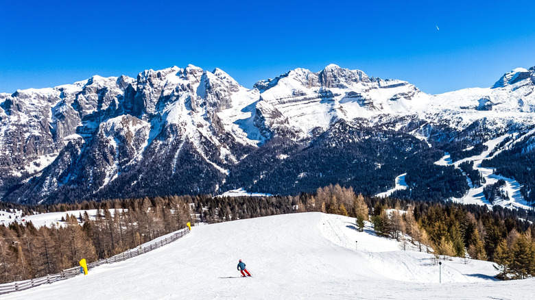 Ski slopes on a sunny day with blue skies