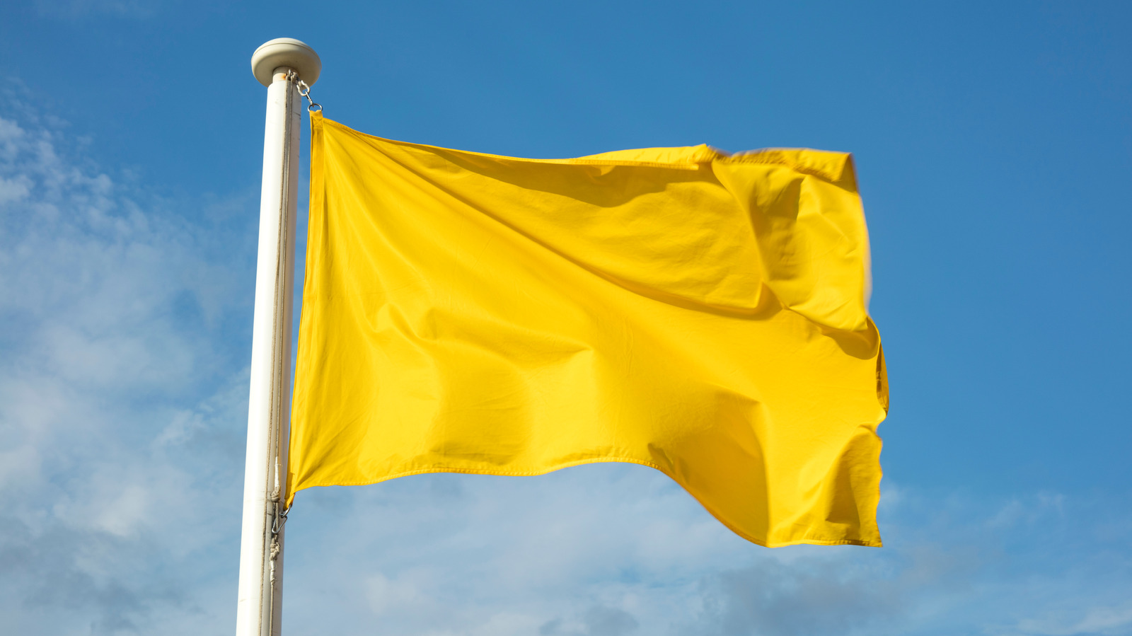 What It Really Means When You See A Yellow Flag At The Beach