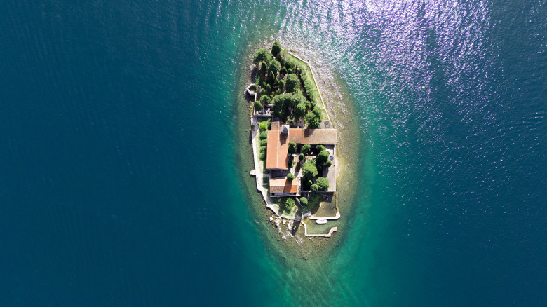 A tiny private island with some buildings on it