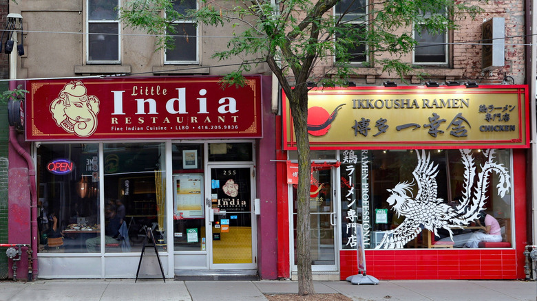 Exterior of two Toronto restaurants offering international cuisine