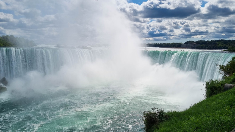 Panoramic view of the Horseshoe Falls of Niagara Falls with tower of mist