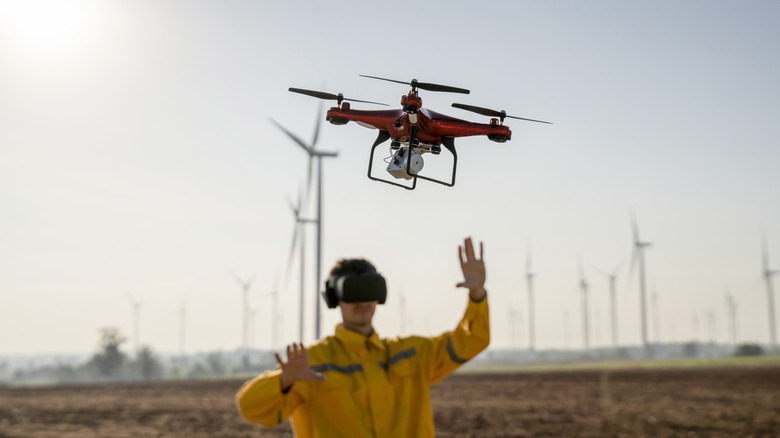 Drone pilot setting off a drone