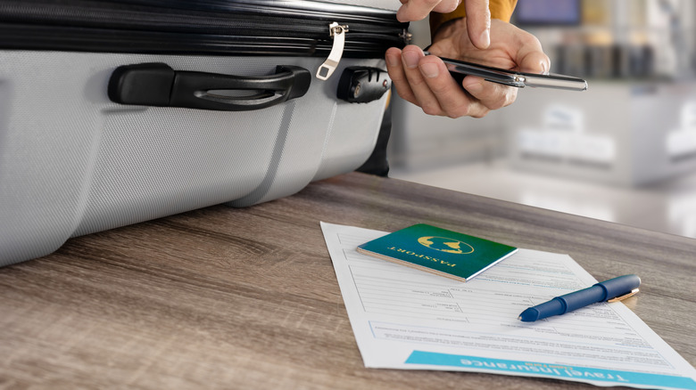 A traveler booking travel insurance