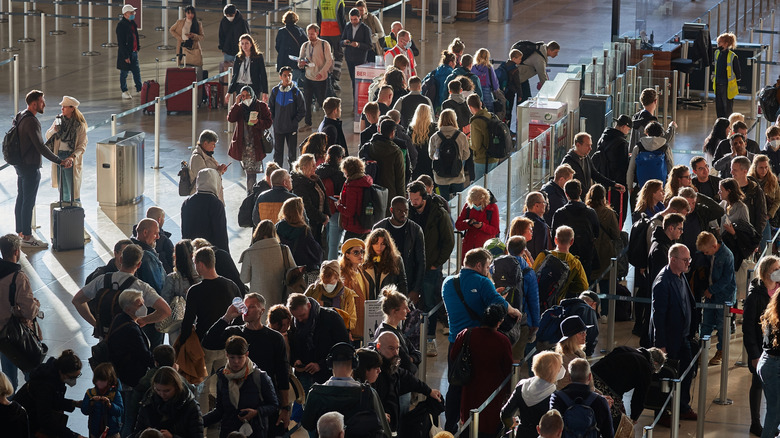 Crowded departure hall at Berlin Brandenburg International Airport