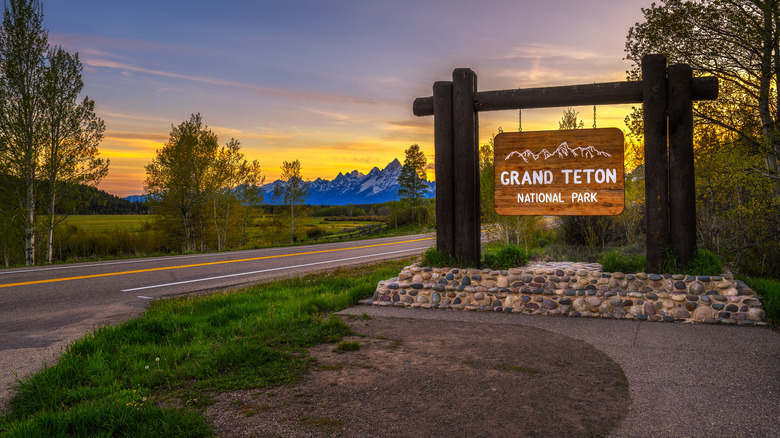 Grand Teton National Park sign at sunset