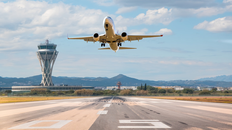 Plane taking off from runway