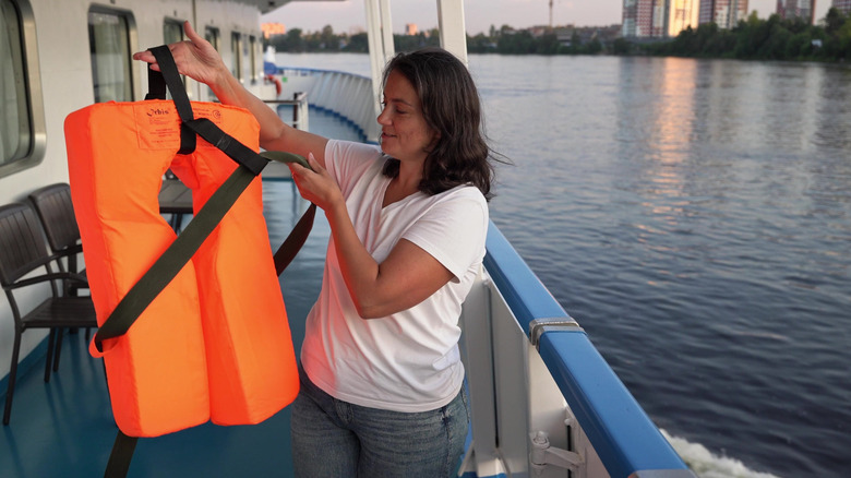 Woman gives safety demonstration on cruise ship