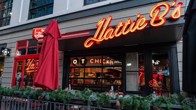 A neon sign reading Hattie B's