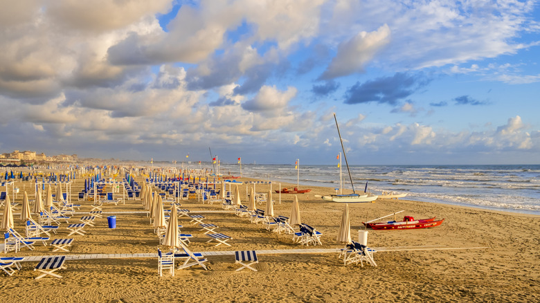 Rows of empty beach chairs at a beach club in Italy