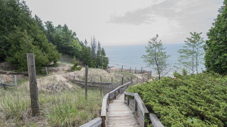 A wooden walkway descending to Lake Michigan