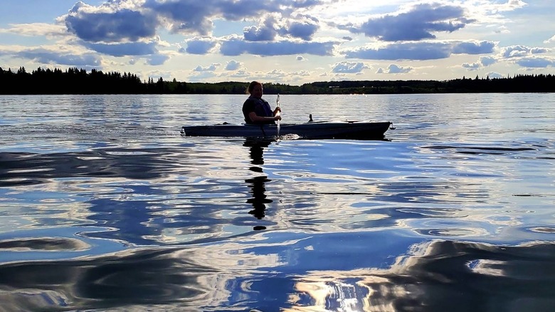 Kayaker paddling on lake at Whitney Lakes Provincial Park