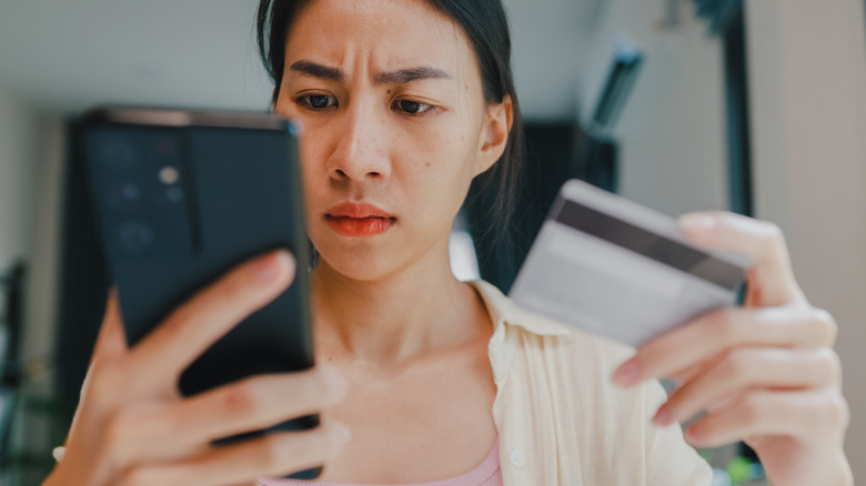 anxious woman trying to get money back