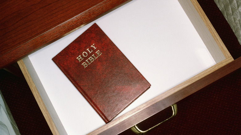 Hotel room bible in an open drawer