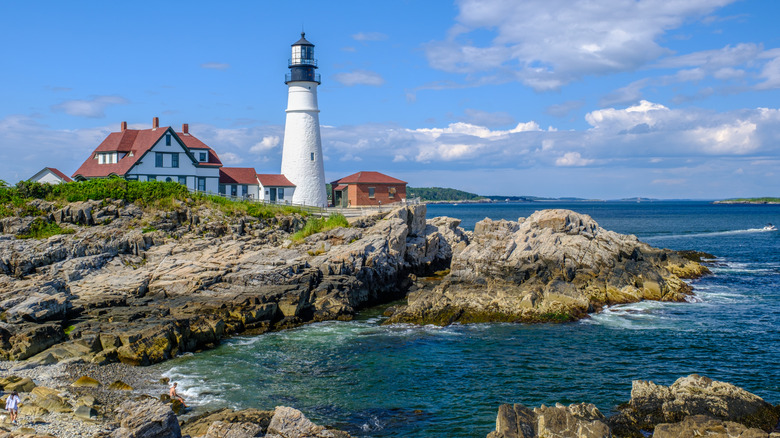 A lighthouse on the ocean in Portland, Maine