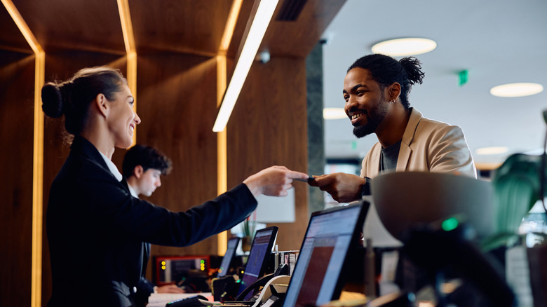 Person checking into a hotel