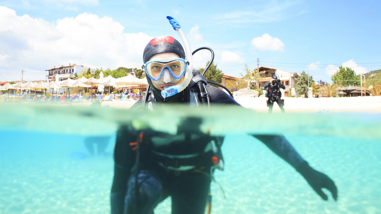 Person snorkeling in shallow waters