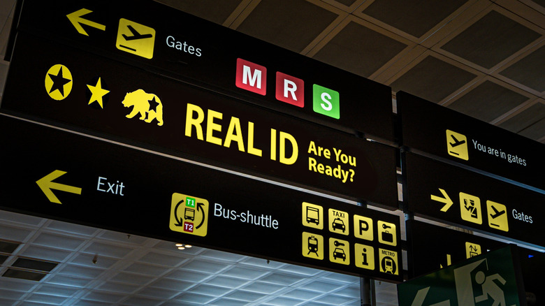 A sign in an airport reminding passengers to get their Real ID