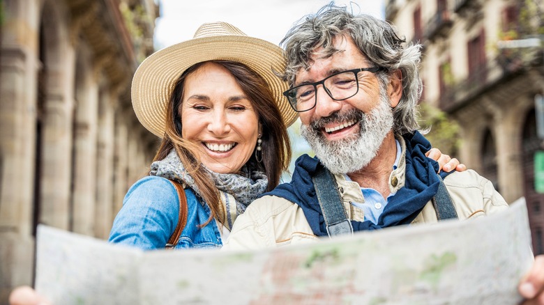 couple studies a map of Rome