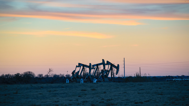 oil drills at dawn in Permian Basin