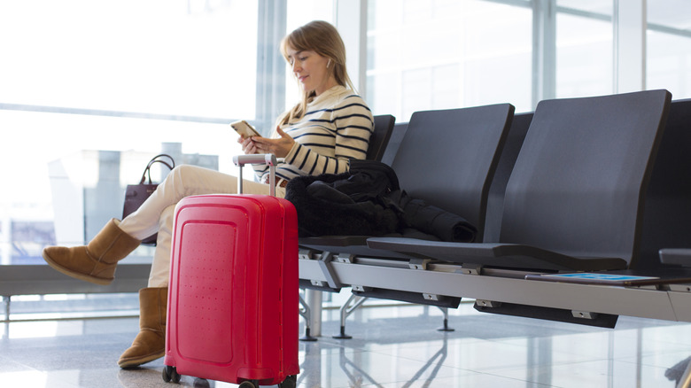 Woman sitting in an airport