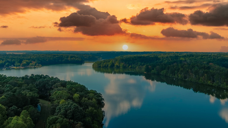 A sunset over the water of Sweetwater Creek State Park in Georgia