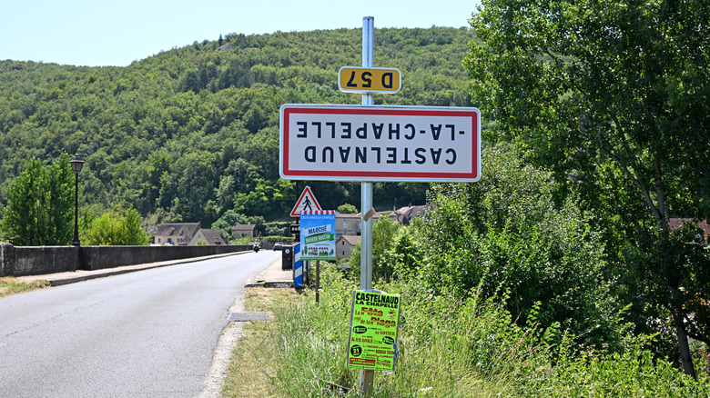 Upside-down sign in rural France