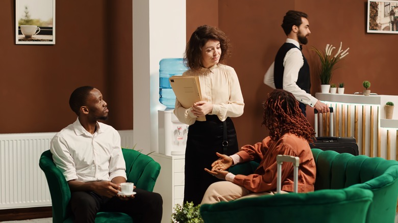 A resort employee selling to guests