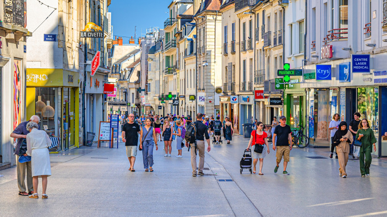 People walking on a pedestrian street in Dijon, France
