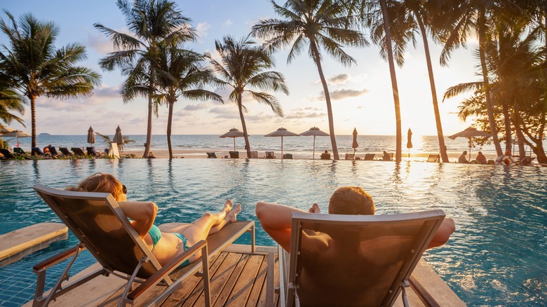 Couple lounges at resort