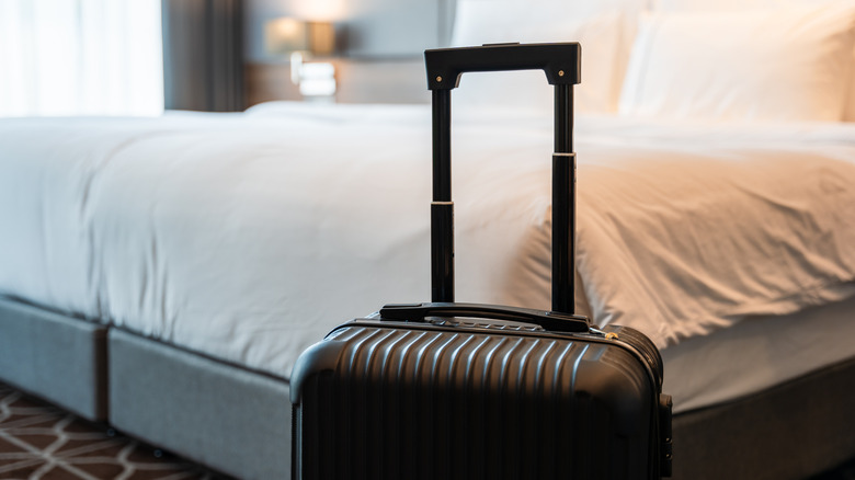 Suitcase in a hotel room